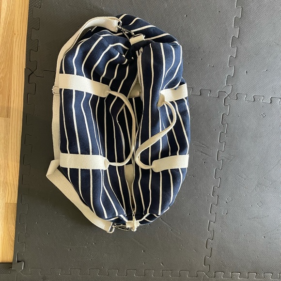 Brandy Melville Handbags - Brandy Melville striped duffle bag